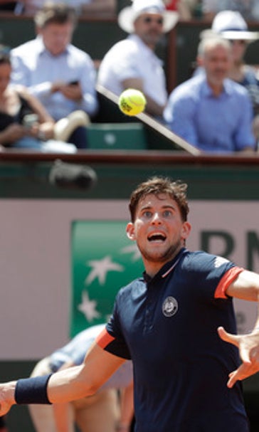 The Latest: Waters, Seydoux unveil trophy at French final